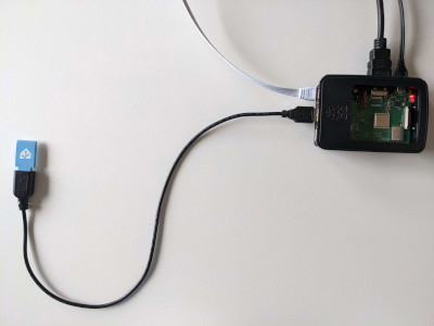 Home Assistant Connect&nbsp;ZBT-1 connected to a Raspberry Pi via extension cable