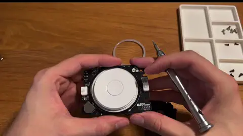 Clip showing how to remove the dial and center button