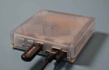 Image showing the flash drive, Ethernet cable, and power supply all plugged into Home Assistant Yellow